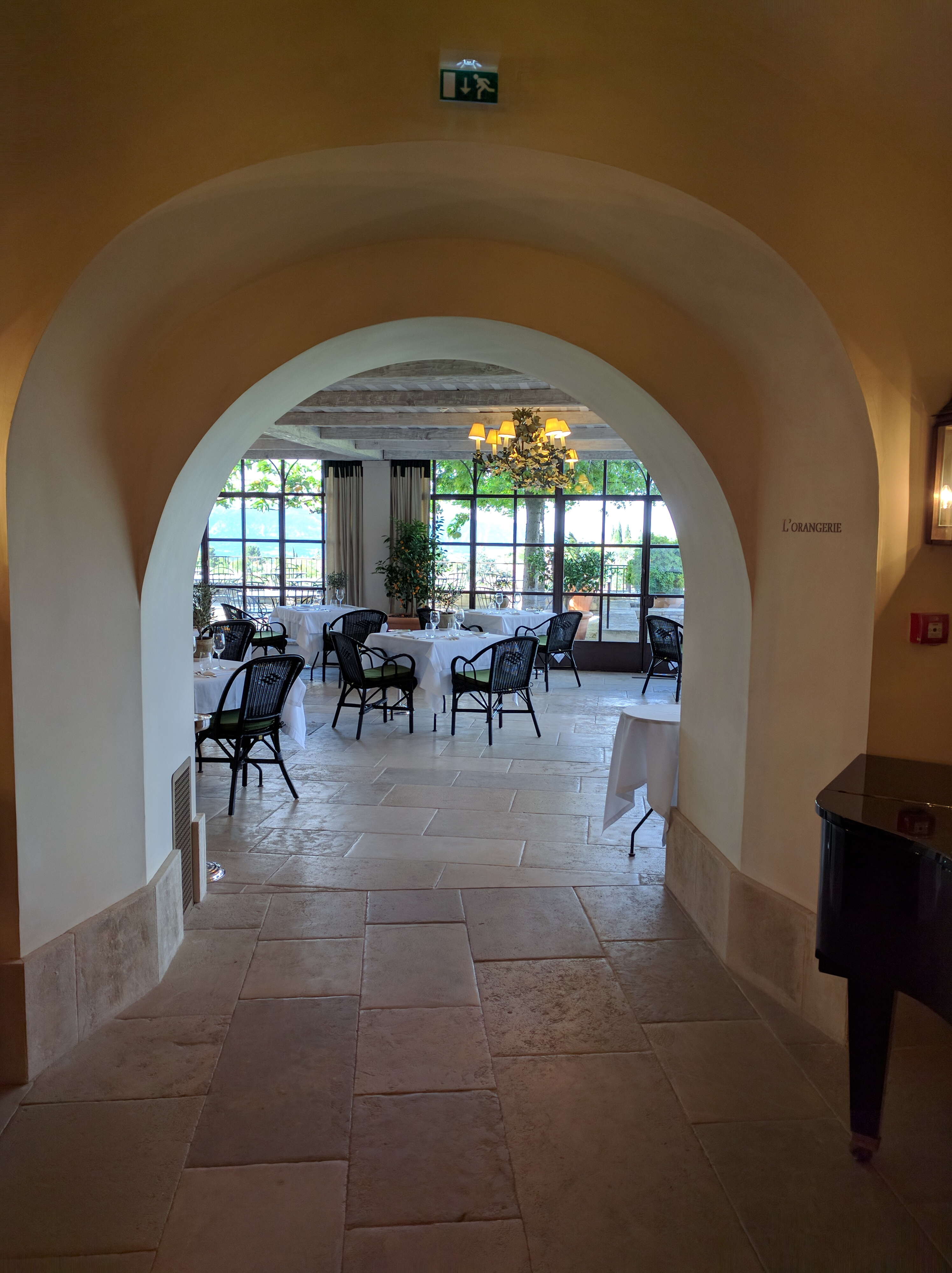 One of the dining rooms, looking out over the valley with glass walls