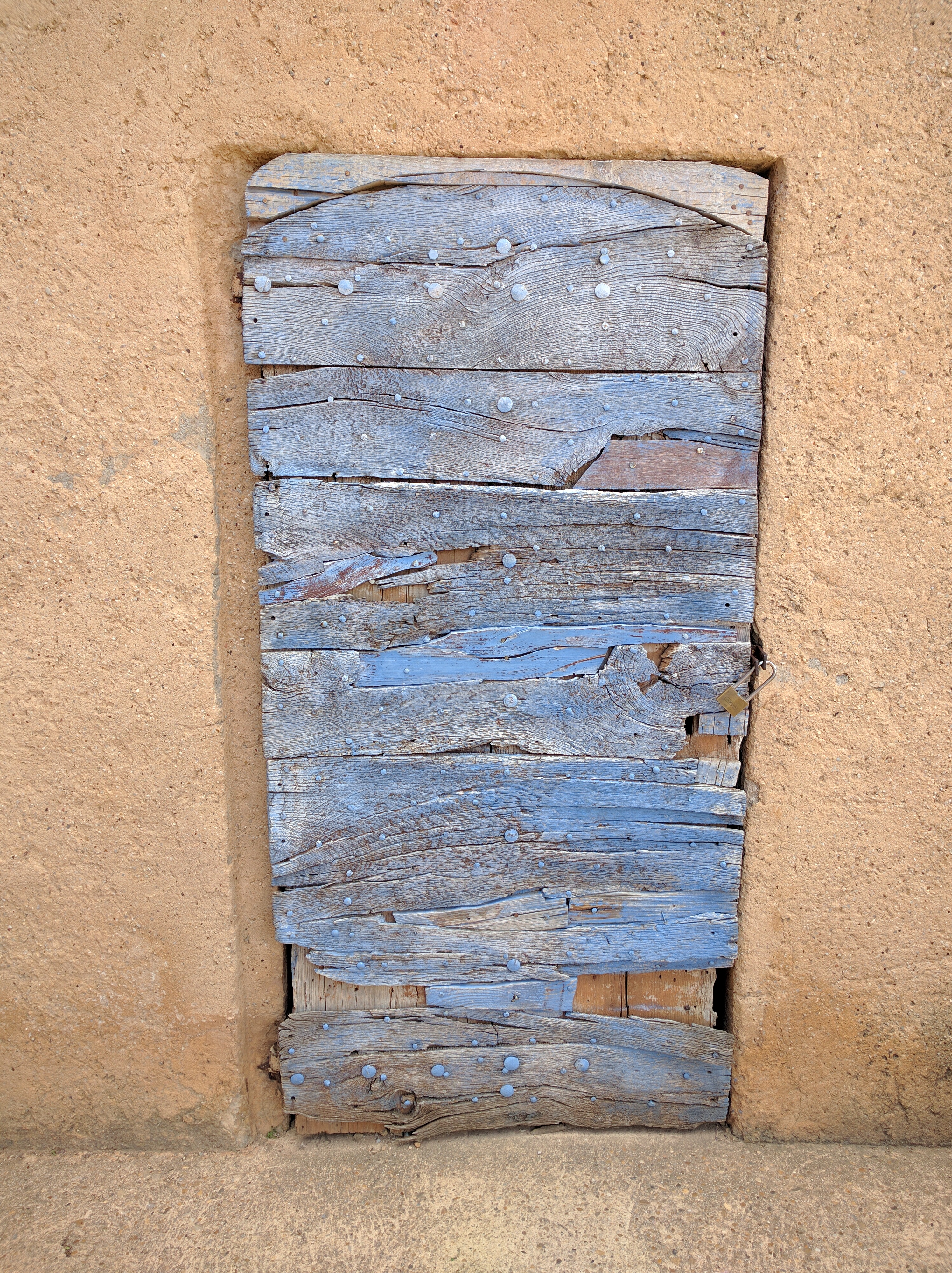 Roussillon seemed to have lots of doors in blue; Kelly liked this very faded one on a church